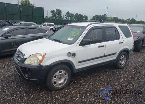 2006 Honda Cr-V Lx z USA, uszkodzony, nr VIN JHLRD78516C062988